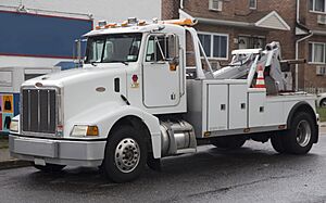 1996 Peterbilt 385 4x2 tow truck, front left side