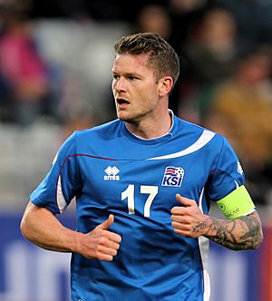 2014-05-30 Austria - Iceland football match, Aron Gunnarsson 0265-crop