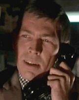 James Coburn in Charade