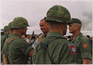 President Lyndon B. Johnson in Vietnam, With General William Westmoreland decorating a soldier - NARA - 192511