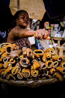 Woman selling ponmo