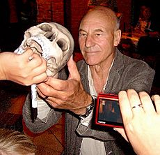 Patrick Stewart signing autographs