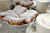 Beignets and Café au Lait at Café du Monde, New Orleans.jpg