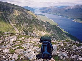 A loch deep in a valley surrounded by mountains