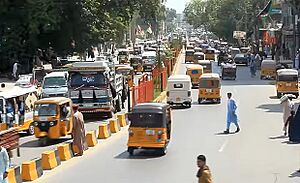 Jalalabad street with rickshaws