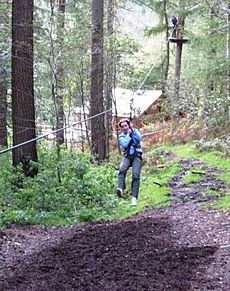 Woman riding a zip-line