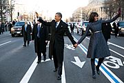 Barack Obama and Michelle Obama in inaugural parade 01-21-13