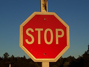 Stop sign at sunset