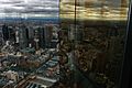 View-over-Melbourne-CDB-reflected-in-Eureka-Tower-window,-12.8.2008