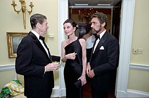 President Ronald Reagan talking with Audrey Hepburn and Robert Wolders