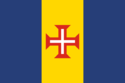 Blue-gold-blue vertical triband with a red-bordered white Cross of Christ.