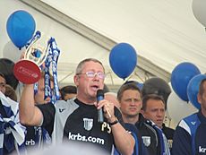 Paul Scally with Playoff trophy