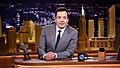 Jimmy Fallon at desk