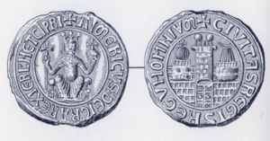 Photo of two ancient silver circular seals of Aimery, with non-Latin words framing the outer part of the seals.