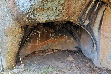 A rock painting of Bunjil.