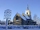 Coton church and village sign.jpg