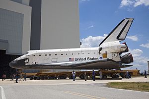 STS-135 Atlantis approaches the VAB