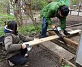 Sawing a board to length for boardwalk in GT