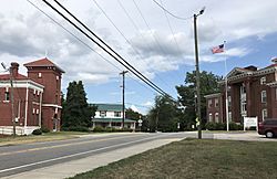 Center of Wentworth, with the former jail at left and the former county courthouse at right