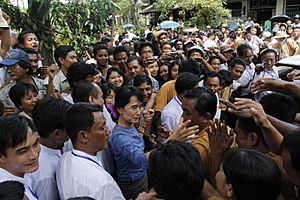 Aung San Suu Kyi greeting supporters from Bago State