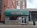 Close-up view of the facade of Nam-Viet restaurant in Clarendon