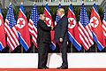 Kim and Trump shaking hands at the red carpet during the DPRK–USA Singapore Summit