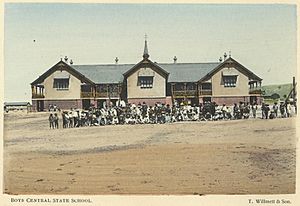 StateLibQld 1 258458 Students and staff gathered outside Boys Central State School, Charters Towers, 1904