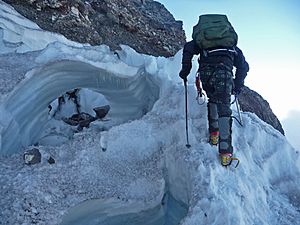 Climbing over a Crevasse Bridge