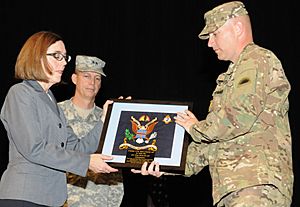 Kate Brown accepts an award