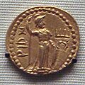 Coin of Kushan king Huvishka 126 163 with Kushan goddess Rishti depicted as Roma copied from a Roman coin