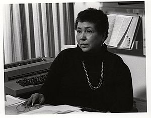 Louise Daniel Hutchinson, at the Anacostia Community Museum, seated in her office, 1983.