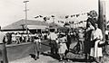 StateLibQld 2 299565 Crowd observing the first tram in Mount Gravatt, 1951