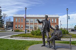 Statue of Alexander and Elliot Galt with 1910 Hospital Building