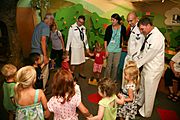 US Navy 110831-N-YM440-026 Sailors take part in Story Tree Time at Duke Energy Children's Museum during Cincinnati Navy Week 2011, one of 21 Navy W