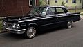 1962 Mercury Comet 4-door sedan (black, front left)