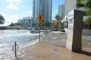 October 17 2016 sunny day tidal flooding at Brickell Bay Drive and 12 Street downtown Miami, 4.34 MLLW high tide am