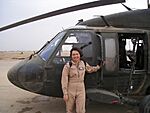 Tammy Duckworth stands by her UH-60 Blackhawk helicopter (001130-A-FI215-212).jpg