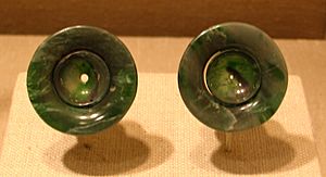 Olmec jade ear flares, Met