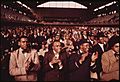 A PORTION OF A CROWD OF SOME 10,000 MUSLIMS APPLAUD ELIJAH MUHAMMAD DURING THE DELIVERY OF HIS ANNUAL SAVIOR'S DAY... - NARA - 556243