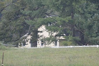 Hinton Rowan Helper House from US 64.jpg