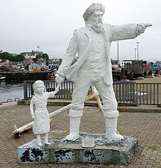 Fisherman and child, Mallaig