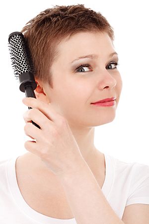 Woman Brushing Hair