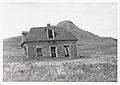 Photograph of the old Big Muddy North West Mounted Police (NWMP) post (1902-1917). Building originally built by James Marshall, then traded to the Mounties for a larger barracks located across the road.