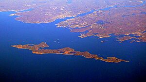 Fishers Island with the coast of Groton, Connecticut in the background.