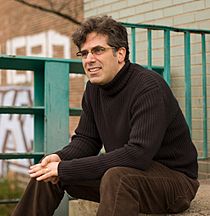 Jonathan Lethem on the banks of the Gowanus Canal in Brooklyn, NY