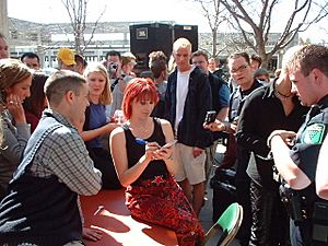 Tiffany signing autographs at UVU