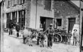 Donkeys outside a warehouse, Pwllheli (copy of jtoo001) NLW3363760