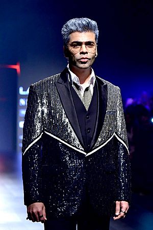 Karan Johar walks the ramp for Shane and Falguni Peacock.jpg