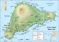 A triangular island, at one point a mountain with a large crater pokes out of the sea. Most of the mountain has been eroded back to a sea cliff surrounding a crater, only a fifth of the mountain slopes gently to the corner of the island.