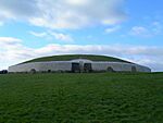 A monumental stone structure in the middle of the field